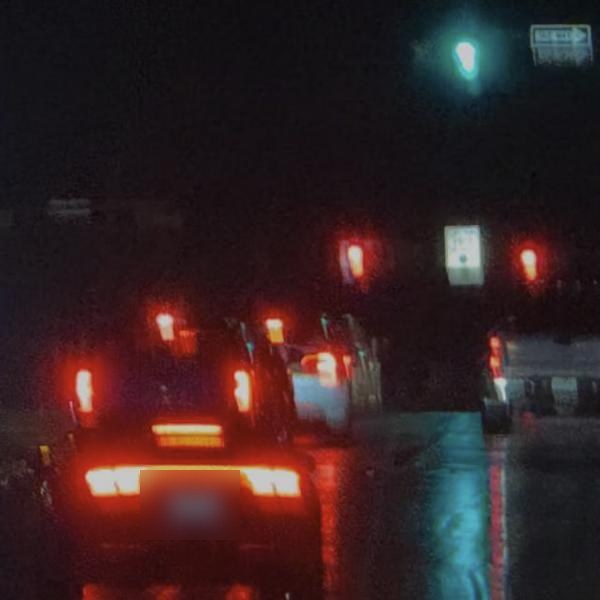 Red tail lights on a rainy night on I-35 in Kyle
